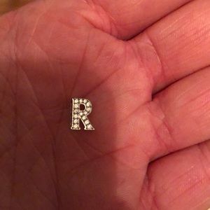 “R” charm Henri Bendel